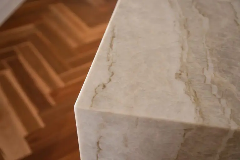 A mitred stone waterfall edge on a kitchen island